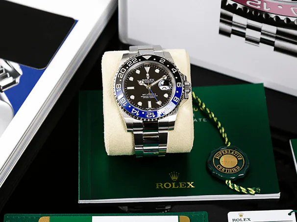 Rolex GMT-Master II Batman with box and certification, maximizing luxury watch value.