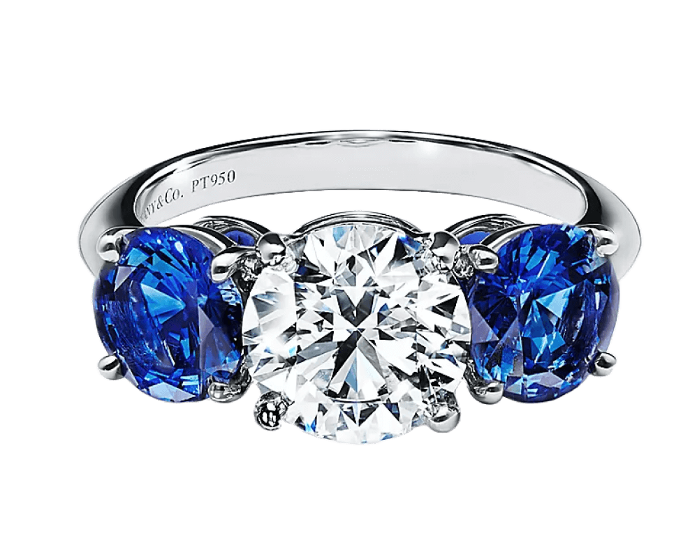 Three-stone diamond and sapphire engagement ring used for collateral-based loan.