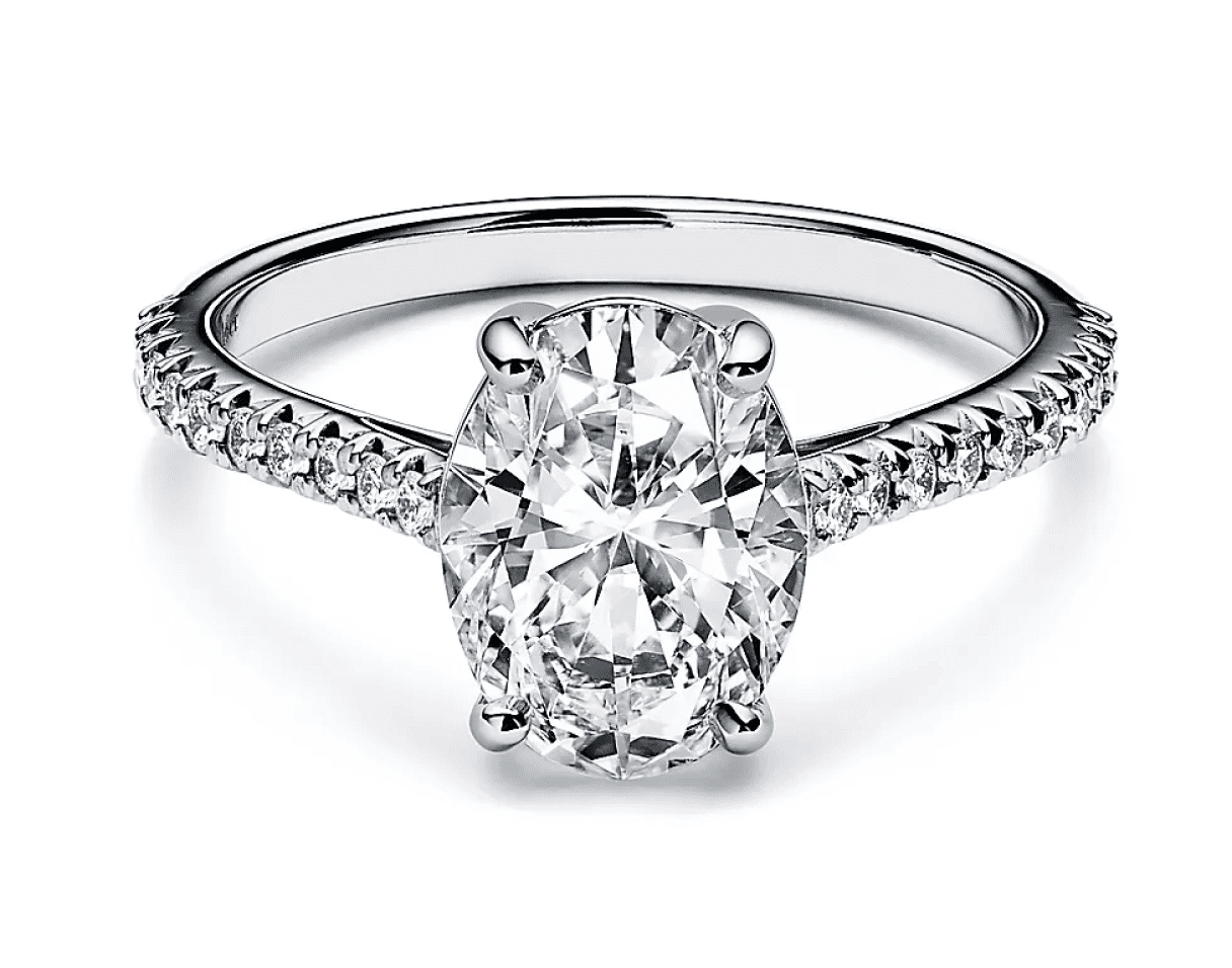 Solitaire diamond engagement ring with pavé band offered for a same-day jewelry loan.