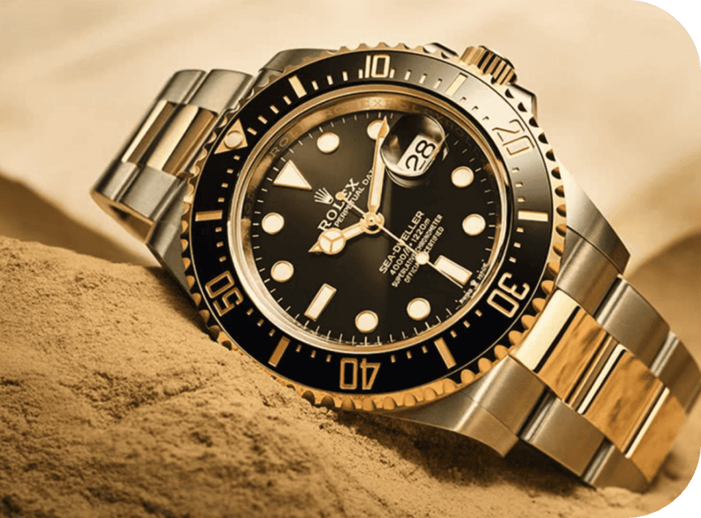 Rolex Submariner watch in sand used as collateral for secured luxury loan.