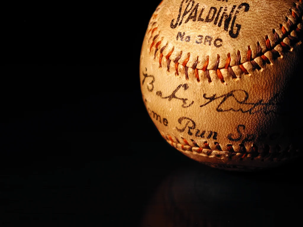 Close-up of a Babe Ruth autographed baseball, an iconic piece of sports memorabilia ideal for collateral loans.