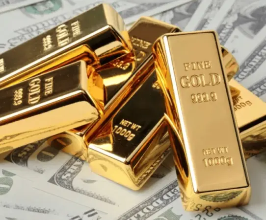 Gold bullion bars—convert your investment into fast cash with Qollateral.