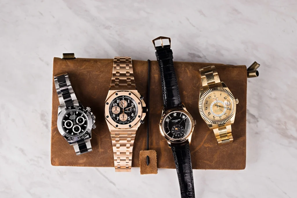 High-end watches accepted for pawn loans at Qollateral, including Rolex, Patek Philippe, and Audemars Piguet.