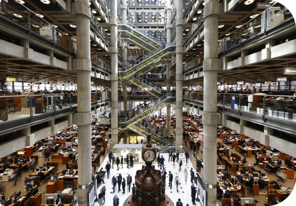 Interior atrium of the Lloyd's of London building with underwriting floor and central clock