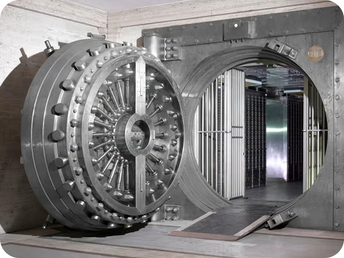 Large open round steel vault door with internal locking mechanism